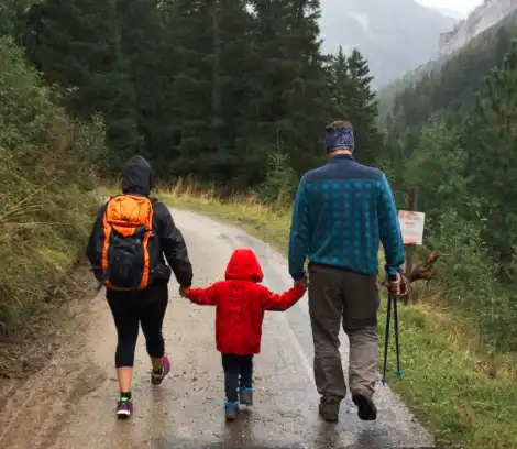 Family walking on path, Insure It Forward